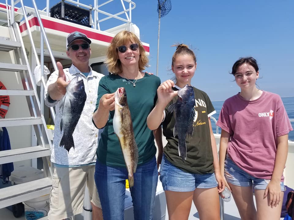 family of four fishing