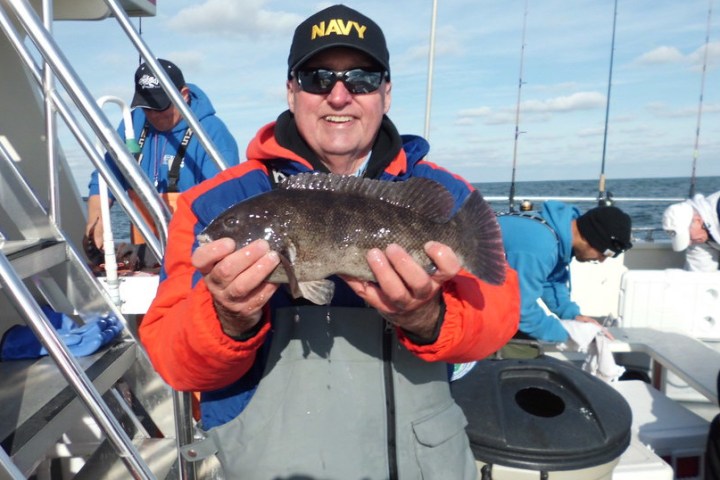 man holding a fish